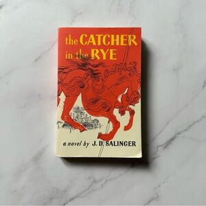 The Catcher in the Rye (by J. D. Salinger) Paperback Book